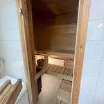 Kotimaailma - Saunallinen Kolmio Herttoniemessae